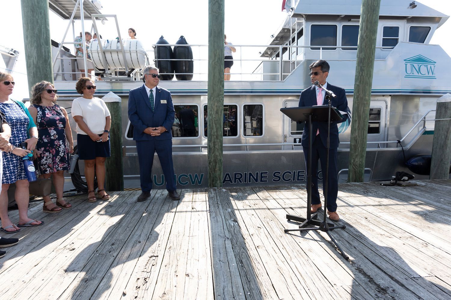 Chancellor Volety speaks on the CMS dock to welcome the R/V Osprey